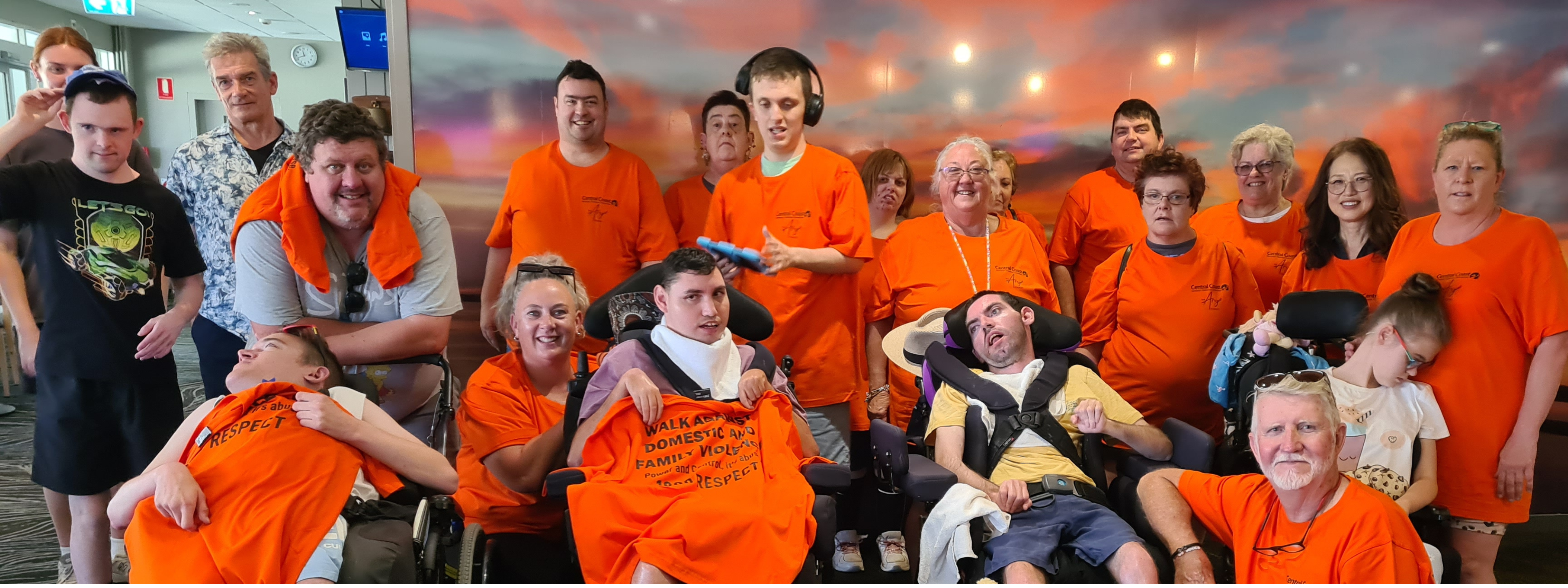 Attendees dressed in orange t-shirts